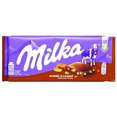 Шоколад молочный Milka с арахисом, карамельной начинкой, рисовыми шариками и кукурузными хлопьями 90г